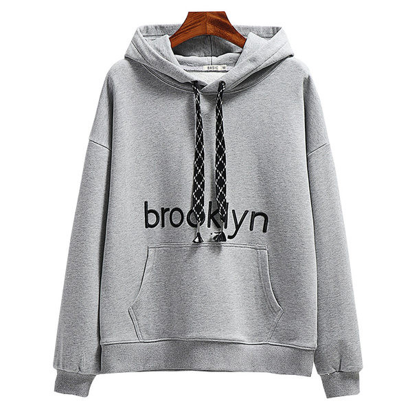 Női pulóver három színben kapucnival