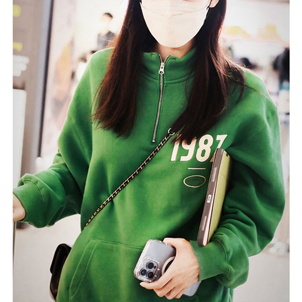 Lezser zöld cipzáras pulóver