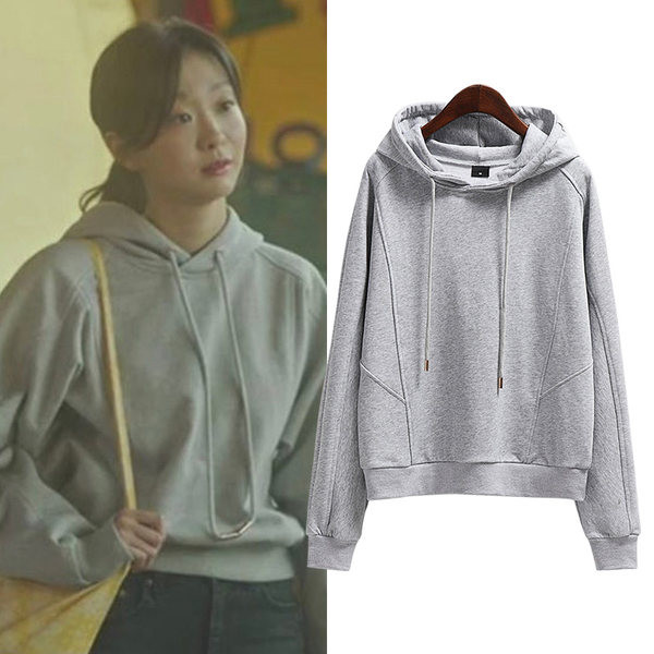 Szürke színű, kapucnival ellátott női pulóverek