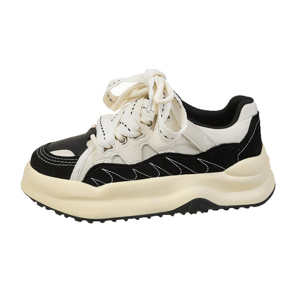 Női tornacipő bézs és fekete színben, kényelmes talppal