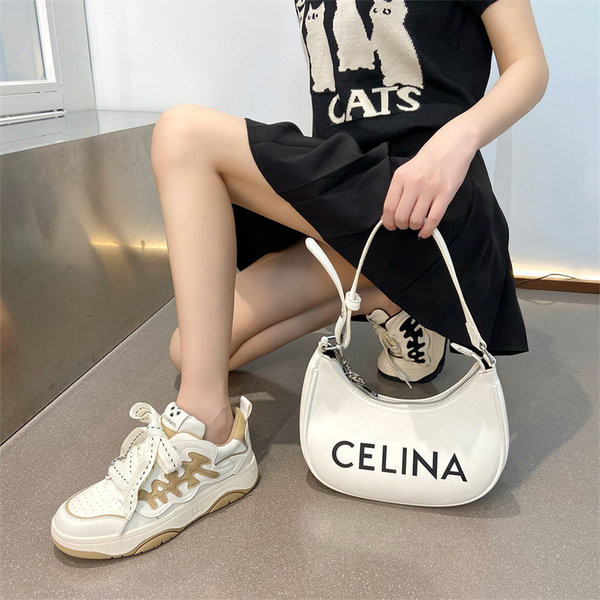 Dviejų spalvų moteriški laisvalaikio sportbačiai su dekoratyviniais elementais