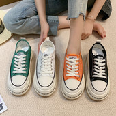 Stílusos női textil tornacipő fűzős felirattal