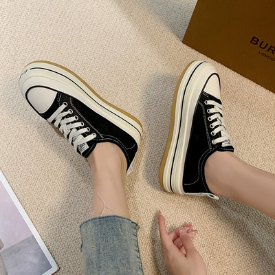 Stílusos női textil tornacipő fűzős felirattal