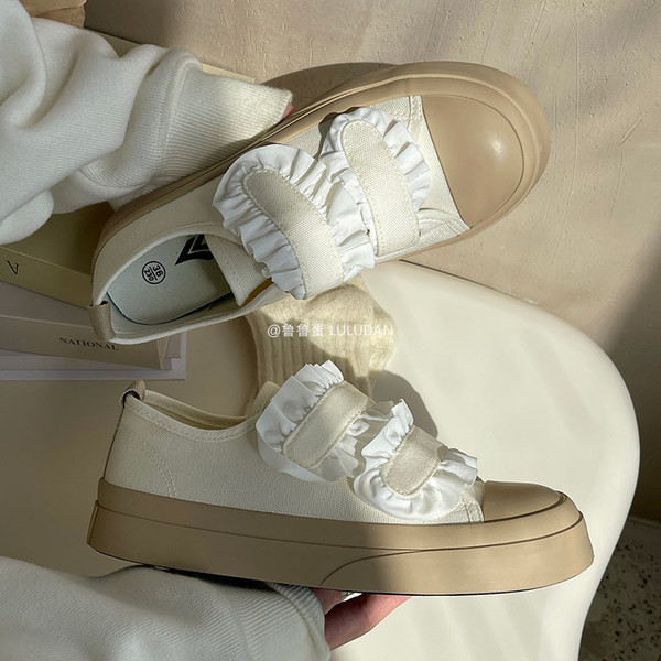 Moteriški tekstiliniai sportbačiai su velcro lopais