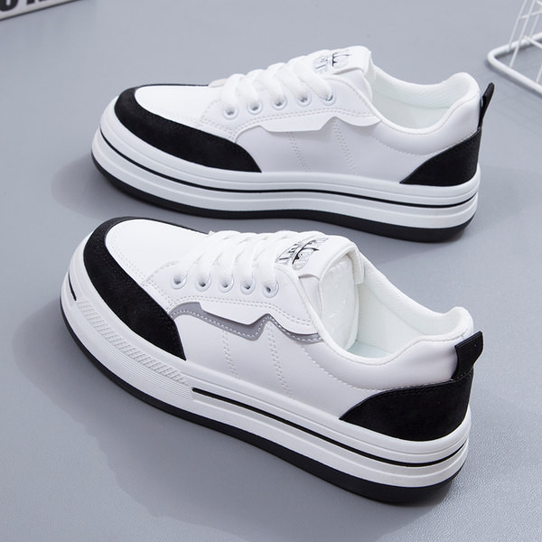 Kahes värvitoonis lameda tallaga naiste tossud