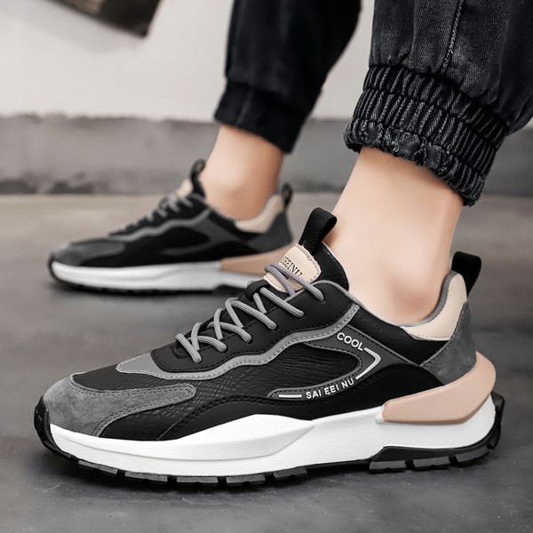 Dekoratiivsete elementidega sportlikud meeste tossud