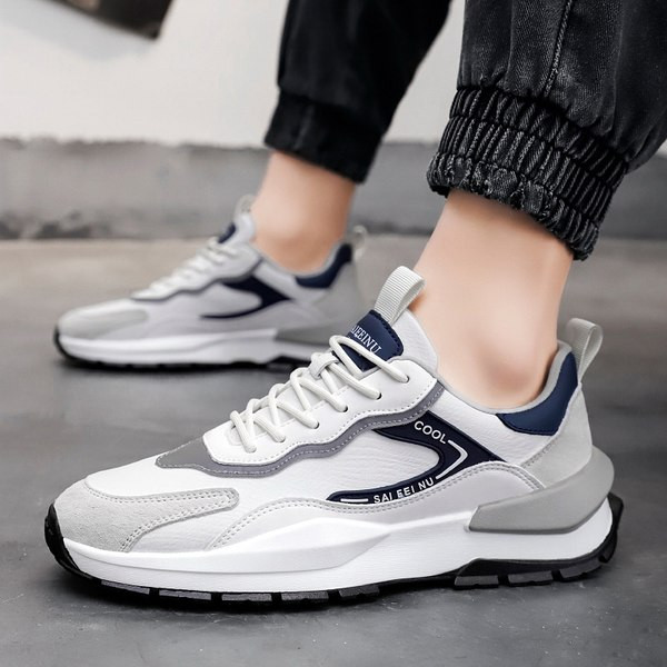 Dekoratiivsete elementidega sportlikud meeste tossud