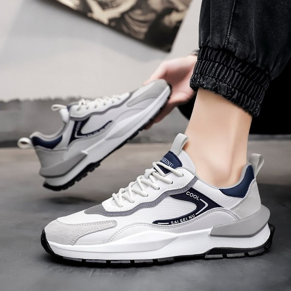 Dekoratiivsete elementidega sportlikud meeste tossud