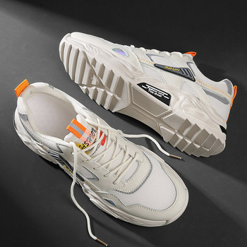 Ανδρικά αθλητικά παπούτσια - λεπτά που αναπνέουν σε λευκό χρώμα