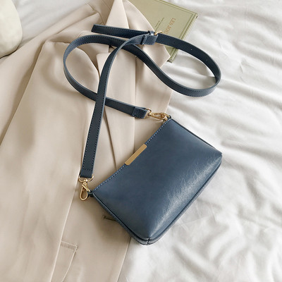 Női kis válltáska több színben