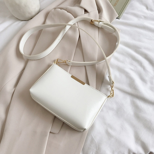 Női kis válltáska több színben