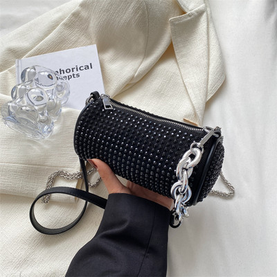 Rankinė su dekoratyviniais akmenimis ir užtrauktuku