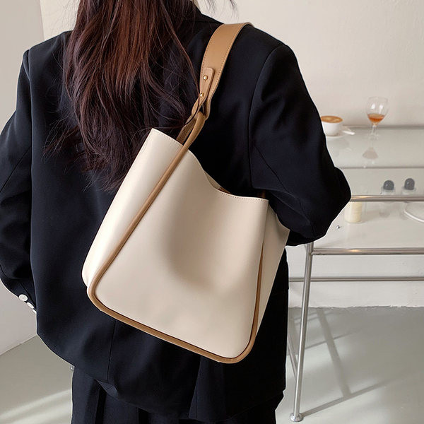 Naiste nahast kandekott metallist lukuga