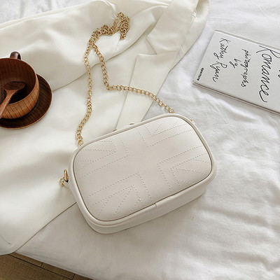 Elegantne kahes värvitoonis käekott