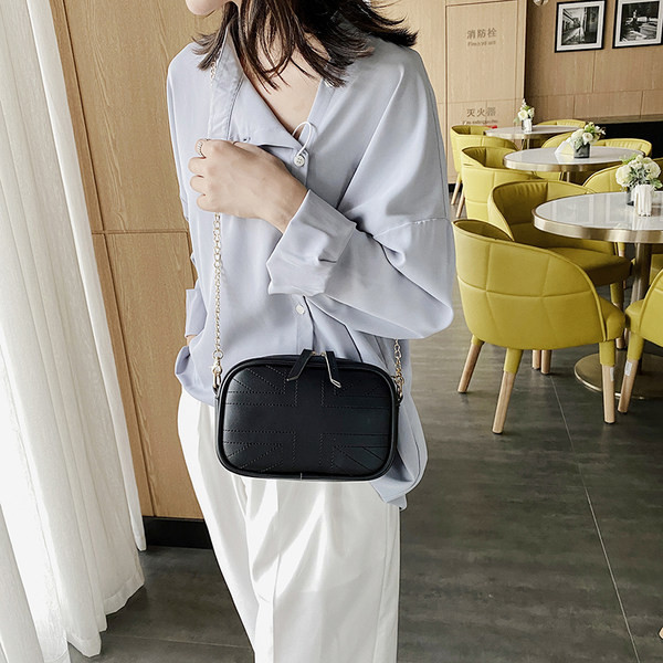 Elegantne kahes värvitoonis käekott