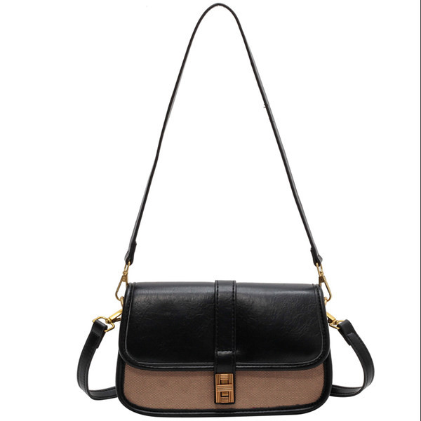 Rudas mažas krepšys su aukso papuošimais