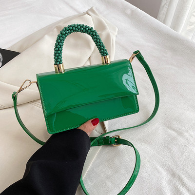 Moteriška kvadratinė rankinė su petnešėlėmis arba ranka