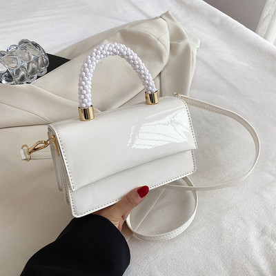 Moteriška kvadratinė rankinė su petnešėlėmis arba ranka