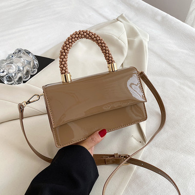 Moteriška kvadratinė rankinė su petnešėlėmis arba ranka