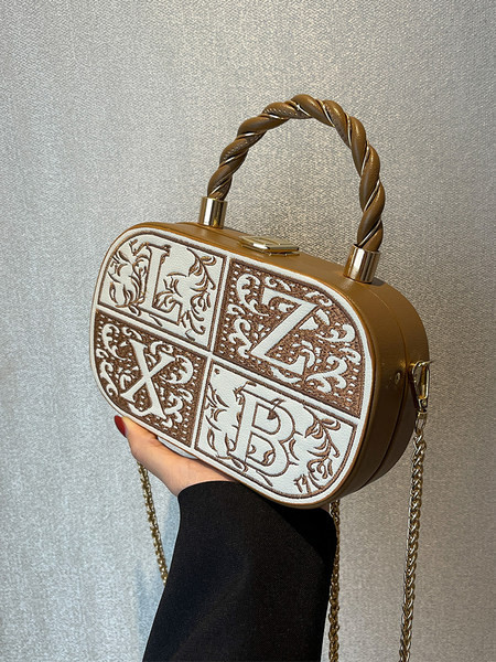 Moderni lagamino tipo rankinė su pečių grandinėle