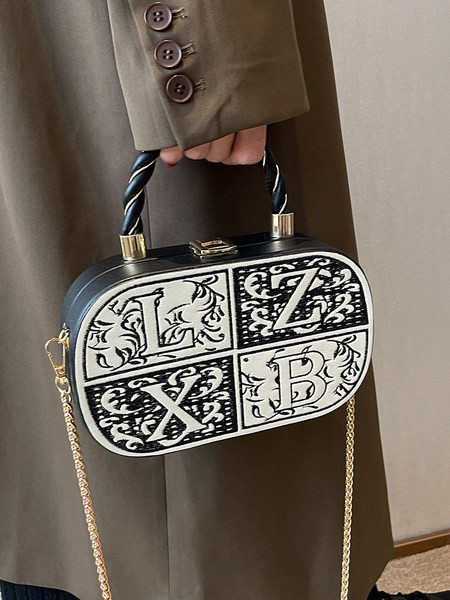 Moderni lagamino tipo rankinė su pečių grandinėle