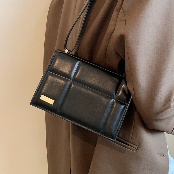 Įvairių spalvų nedidelis laisvalaikio krepšys