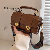 Kis kézitáska széles vállpánttal