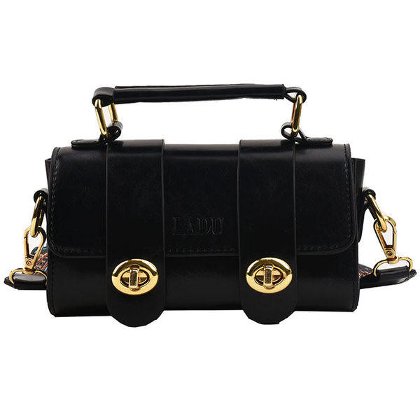 Kis kézitáska széles vállpánttal