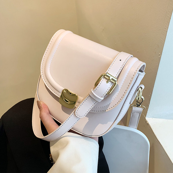 Μικρή τσάντα με φερμουάρ και μεταλλικό κούμπωμα