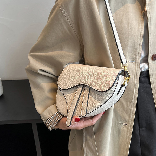 Uue mudeli käekott kolmes värvitoonis