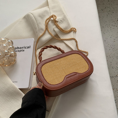 Naiste nahast kohvri tüüpi kott metallist lukuga