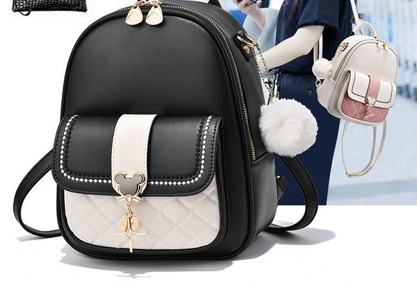 Μοντέρνο γυναικείο δερμάτινο σακίδιο πλάτης με μεταλλική διακόσμηση