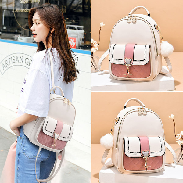 Μοντέρνο γυναικείο δερμάτινο σακίδιο πλάτης με μεταλλική διακόσμηση