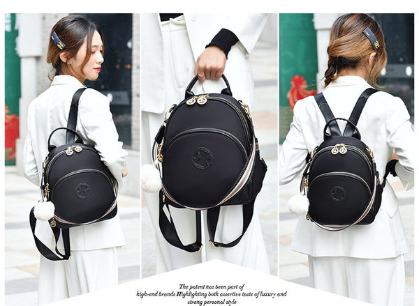 Μικρό γυναικείο σακίδιο πλάτης με φερμουάρ και διακοσμητικό χνούδι