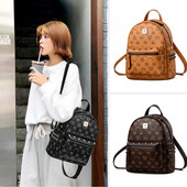 Naiste dekoratiivse elemendiga seljakott