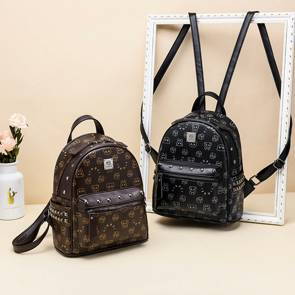 Naiste dekoratiivse elemendiga seljakott