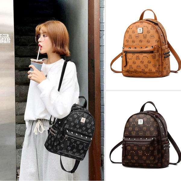 Naiste dekoratiivse elemendiga seljakott