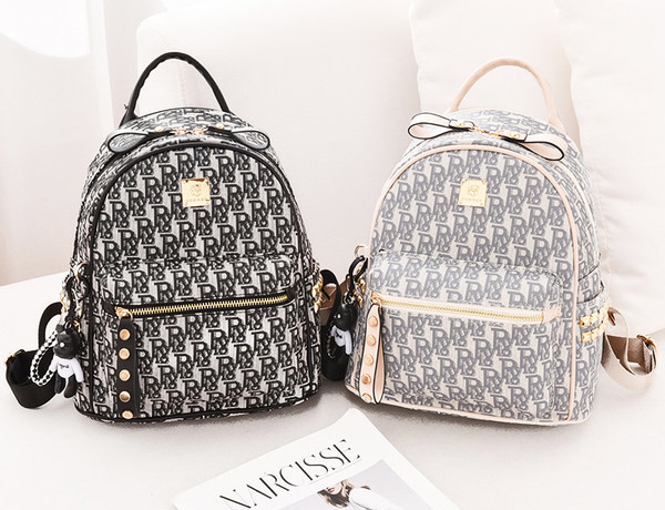 Naiste igapäevane seljakott luku ja võtmehoidjaga