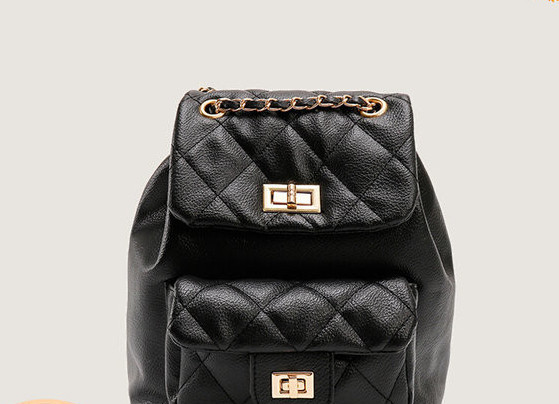 Kahes värvitoonis kuldsete motiividega naiste seljakott