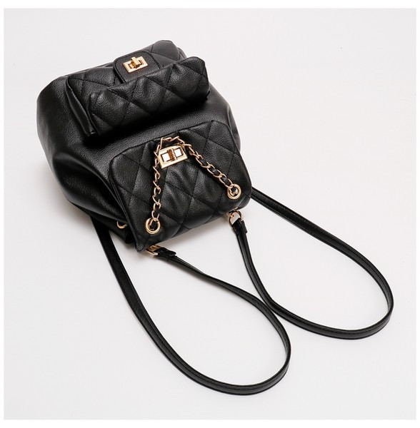 Kahes värvitoonis kuldsete motiividega naiste seljakott