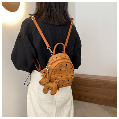 Γυναικείο μικρό σακίδιο πλάτης από οικολογικό δέρμα με μπρελόκ