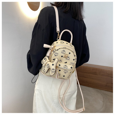 Γυναικείο μικρό σακίδιο πλάτης από οικολογικό δέρμα με μπρελόκ