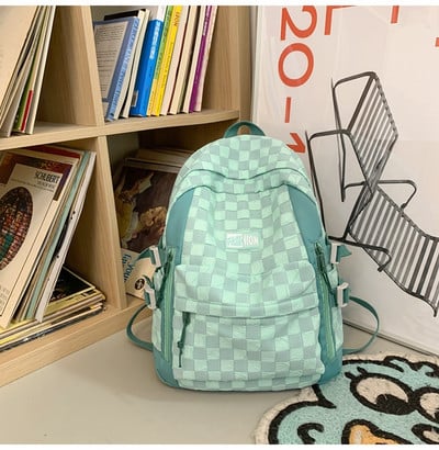 Naiste tekstiilist seljakott esitasku ja tõmblukuga