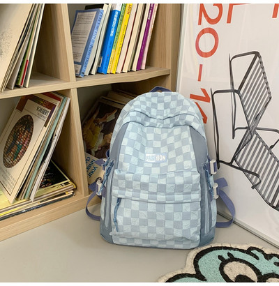 Naiste tekstiilist seljakott esitasku ja tõmblukuga