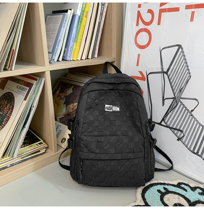 Naiste tekstiilist seljakott esitasku ja tõmblukuga