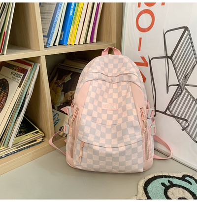 Naiste tekstiilist seljakott esitasku ja tõmblukuga