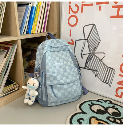 Naiste tekstiilist seljakott esitasku ja tõmblukuga