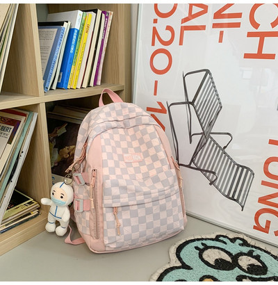 Naiste tekstiilist seljakott esitasku ja tõmblukuga