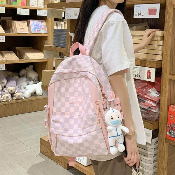 Naiste tekstiilist seljakott esitasku ja tõmblukuga