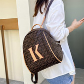 Μικρό μοντέρνο γυναικείο σακίδιο πλάτης από οικολογικό δέρμα με φερμουάρ